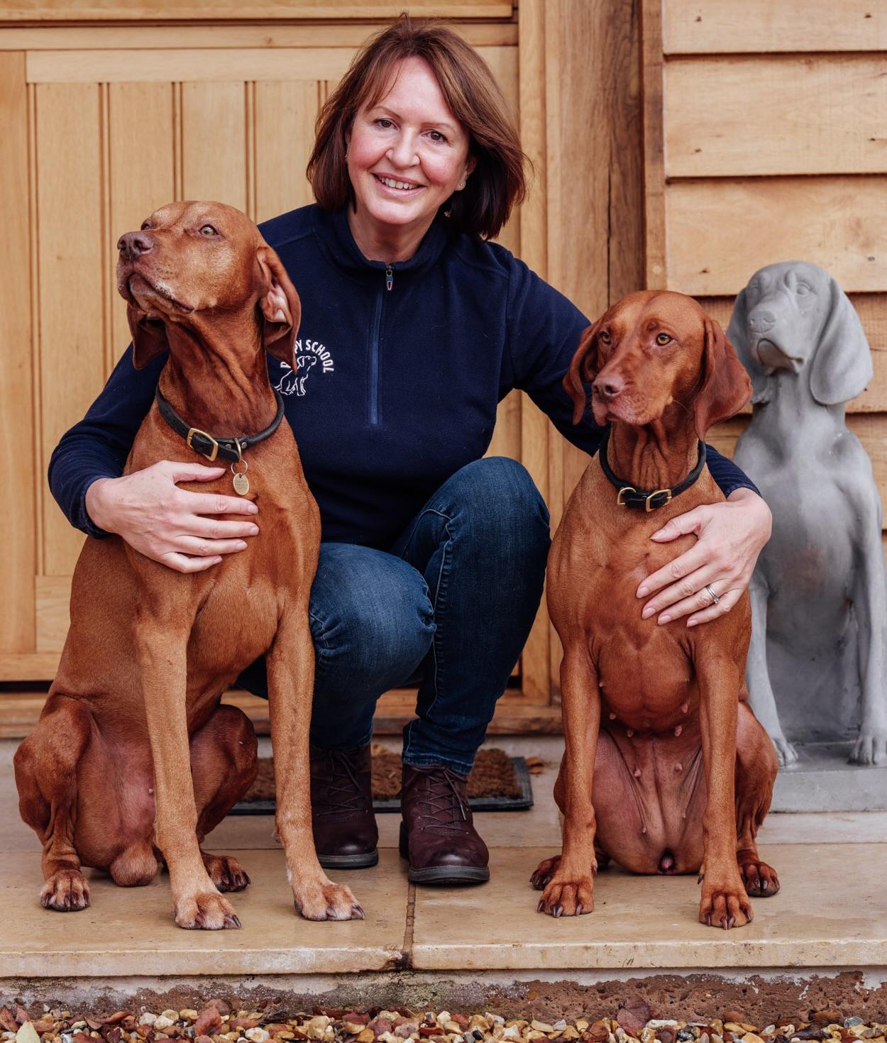 Gwen Bailey, behaviourist and founder of Puppy School with her Vizslas